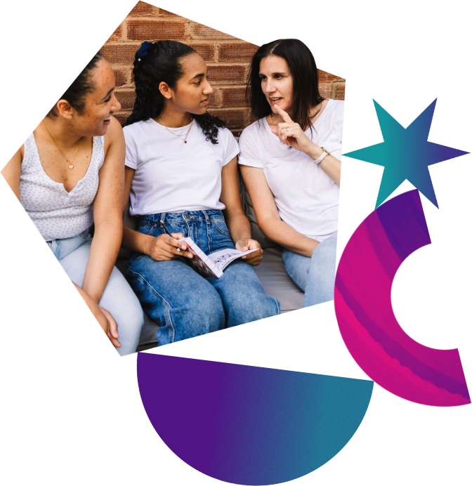A mother talking to her two teenage daughters.