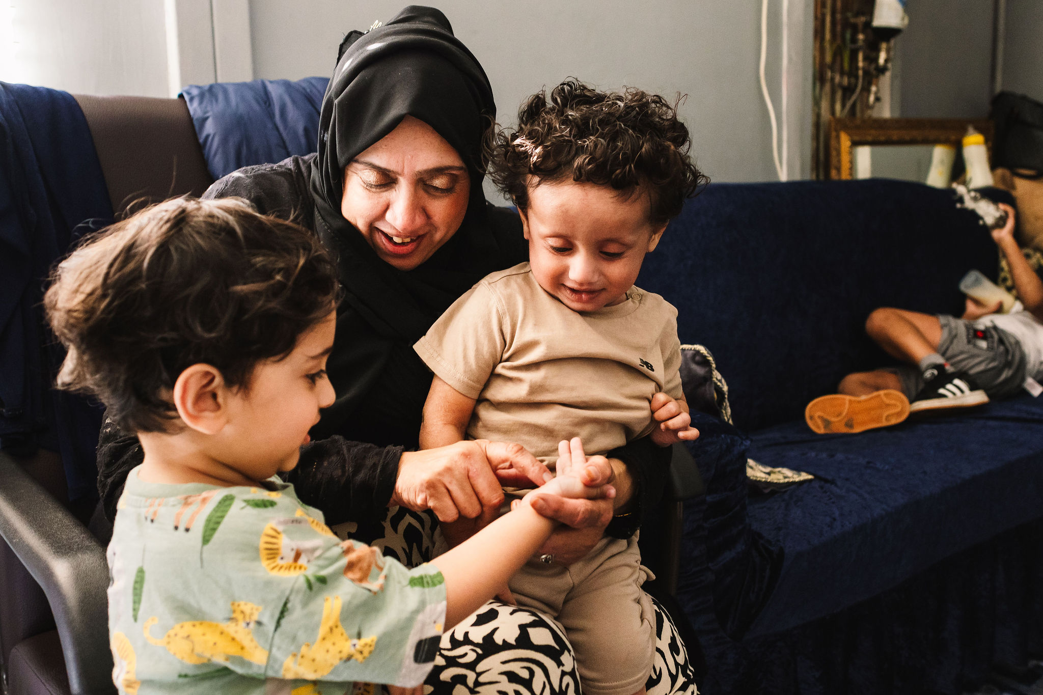 A grandmother spending time with her grandchildren.